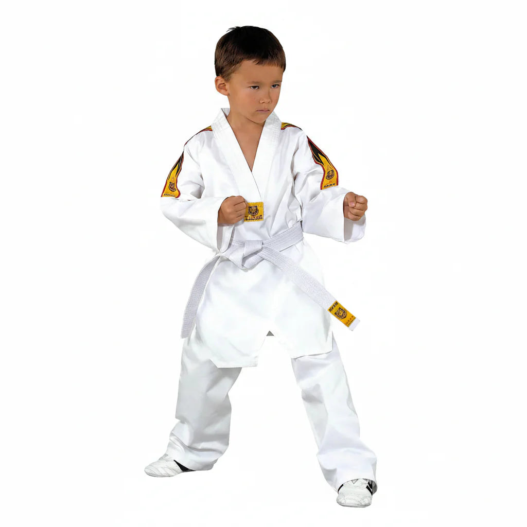 A young martial artist in a white uniform and belt, warmed up and ready for class