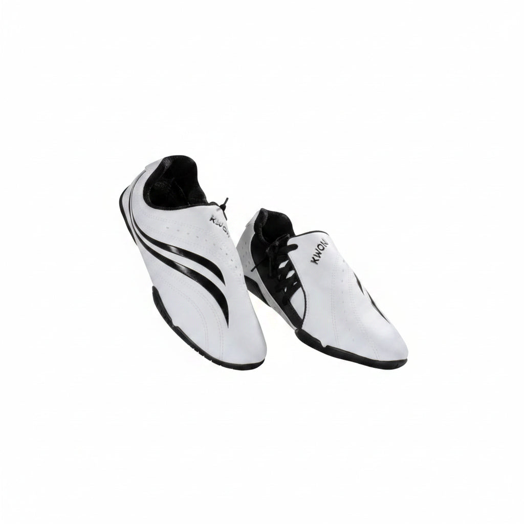 White martial arts shoes with black accents on a white background