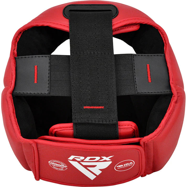 Red boxing headgear with black straps on a white background, featuring RDX branding.