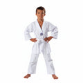 Child wearing a white martial arts uniform on a white background