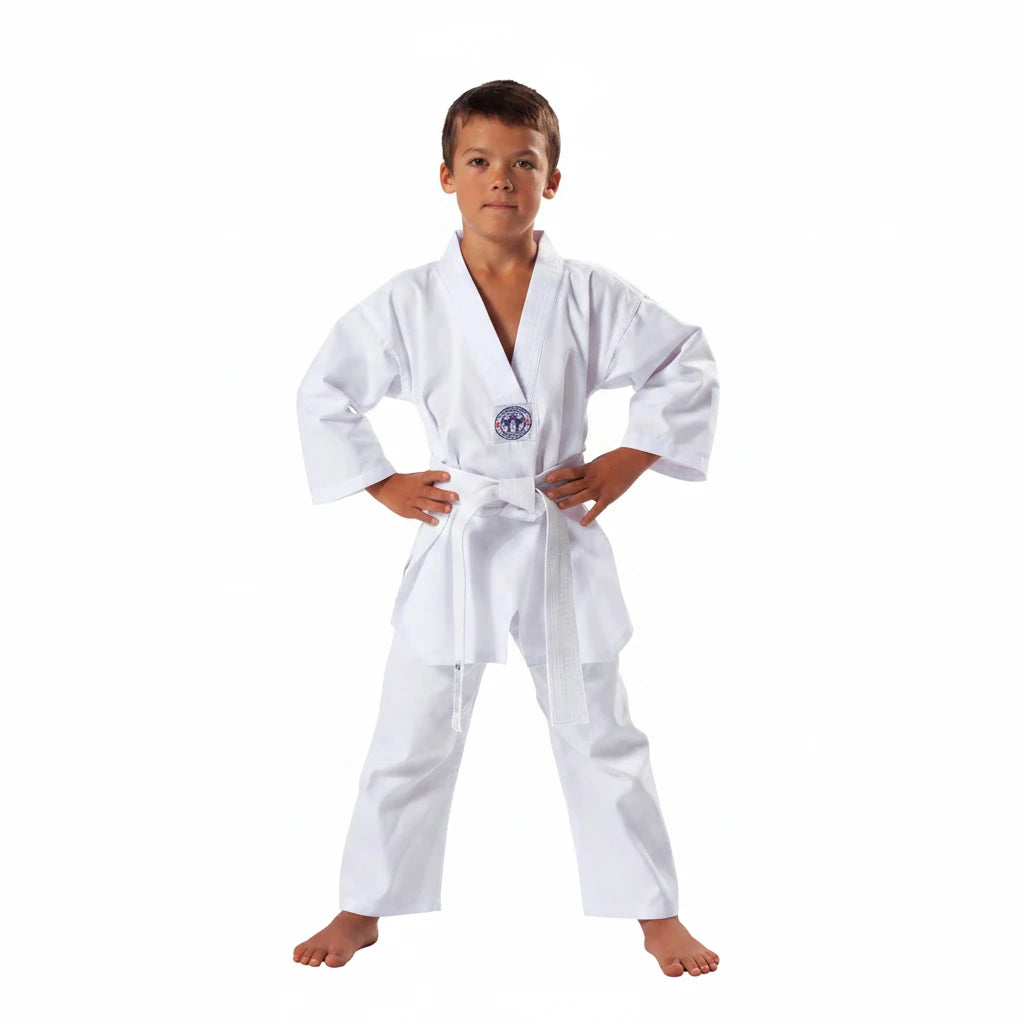 Child wearing a white martial arts uniform on a white background