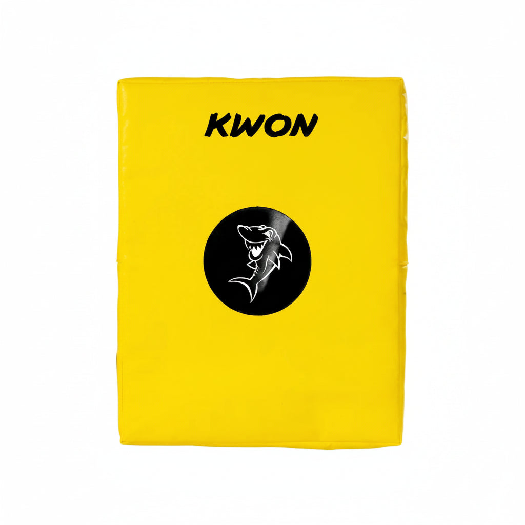 Yellow martial arts shield with 'Kwon' branding and a shark logo on a white background